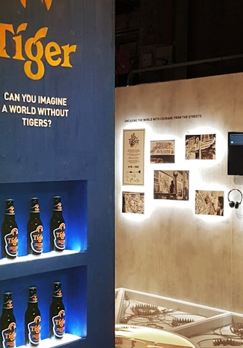 Bridging Design and Conservation: Tiger Awareness Exhibition in Singapore. Studio Königshausen showcases the brand's innovative approach—using thermochromic ink on limited edition cans to make the iconic tiger reappear when chilled.